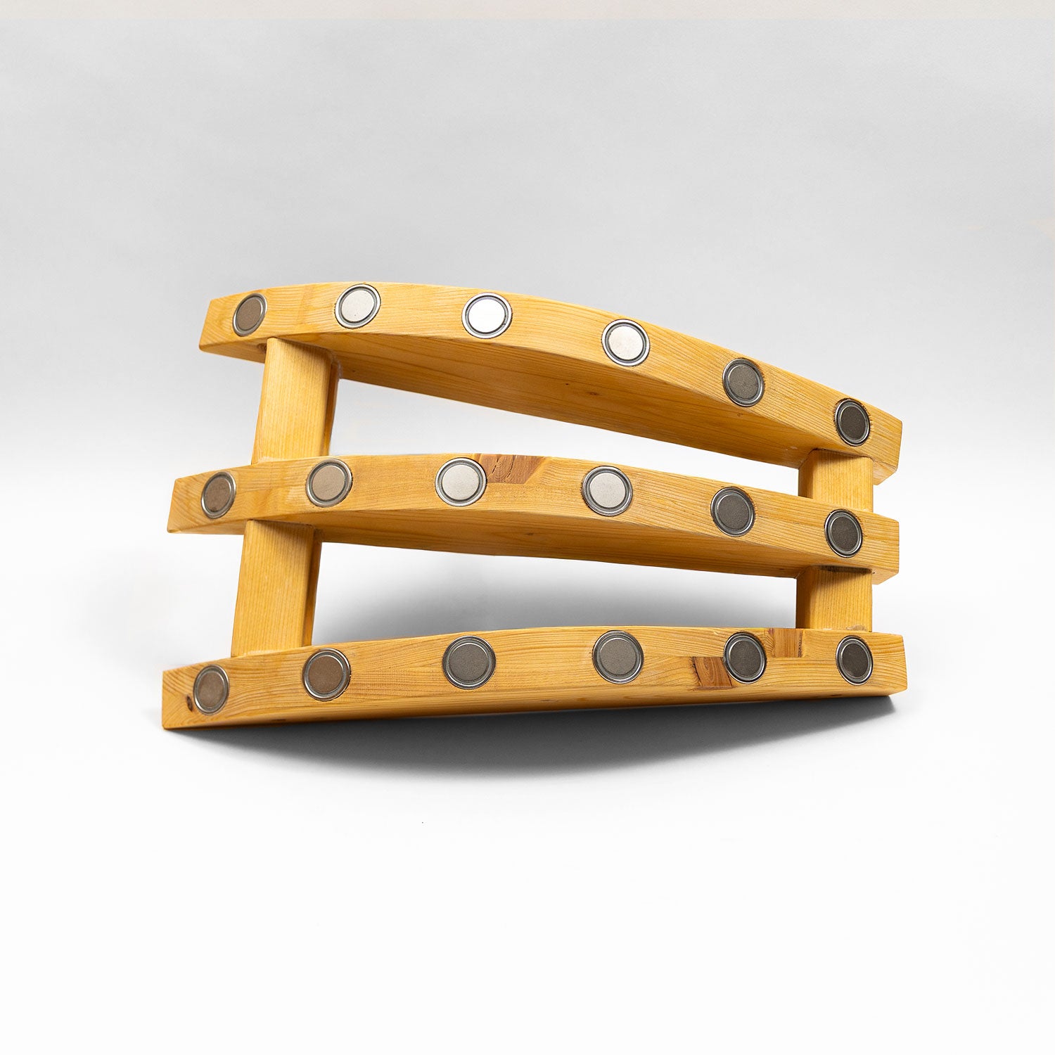 Magnetic arch for spine massage